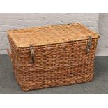 A large wicker hamper basket.