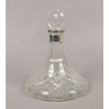 A silver top cut glass decanter, inscription for Glen Eagles 1980, assayed London 1979.