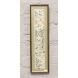 A framed late 19th / early 20th century Chinese silk embroidery depicting figures in the