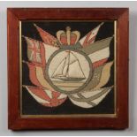 A World War I framed sailor's woolwork picture. Depicting a crowned sailing vessel and flags of