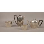 A silver four part tea service assayed Sheffield different date marks, manufactured by Cooper 1886-