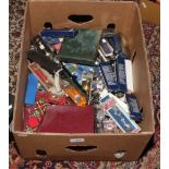 A box of various collectors spoons.