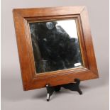 A mahogany and parcel gilt framed square pier mirror.