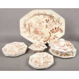 A collection of Victorian Minton dinnerwares in the Japan scroll pattern.