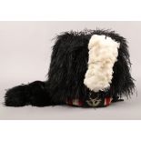 Seaforth Highlanders - A Scottish pipers ostrich feather bonnet, Cuidich 'N Righ badge.