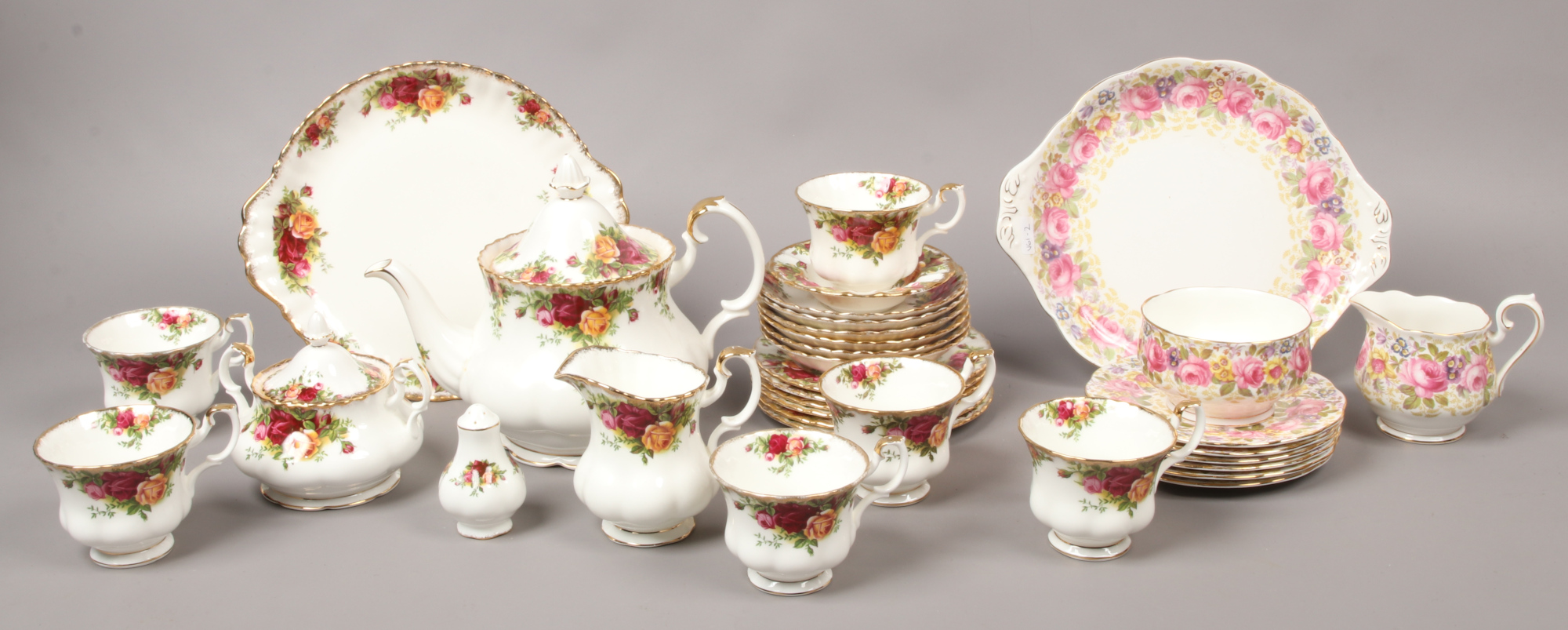 A collection of Royal Albert teawares in two different designs, Old Country Roses and Serena to