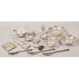 A collection of mainly silver plate items to include vesta cases, sauce boat, salt cellars, silver