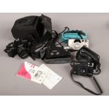 A group of four cameras to include Olympus XA2 with A11 flash, AGFA Optima sensor, Canon Prima and