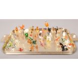 A large quantity of miniature blown coloured glass models of animals, approximately 52.Condition