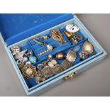 A jewellery box and mixed costume jewellery.