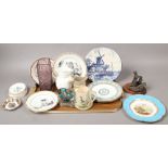 A tray of collectable ceramics and glass to include Delft cabinet plates, Coalport mask head jug,