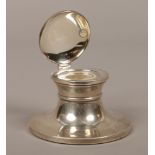 A silver Capstan inkwell assayed Birmingham 1984 by W. I Broadway & Co.