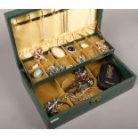 A jewellery box and a small collection of costume jewellery.