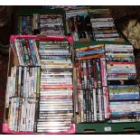 Four boxes of assorted DVDs.