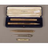 A cased Mabie Todd & Co. gold plated propelling pencil, an Eversharp gold filled propelling pencil