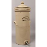 A 19th century stoneware water filter with liner, stamped The Berkefeld Filter Co. Ltd Tubor