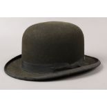 A black felt Derby hat. Front to back 20.5cm side to side 16cm.