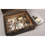 A box of clock and watch parts including balance wheels, glasses, movements, dials etc.