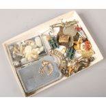 A quantity of vintage collectables including shirt buttons, cufflinks, military badges, stick pins