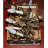 A box of brass wall lights.