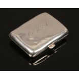 A silver pill box assayed London 2011 by Asprey London, monogrammed, 32 grams.