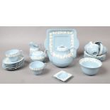 A collection of Wedgwood embossed Queens ware ceramics to include six part teaset, bread and