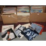 Three boxes of pop, rock and easy listening LP records.