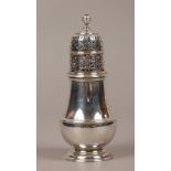 An Edwardian silver shaker assayed London 1905 by William Comyns & Sons, 166 grams.