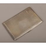 A George V silver cigarette case assayed Birmingham 1929 by John Henry Wynn, 176 grams.