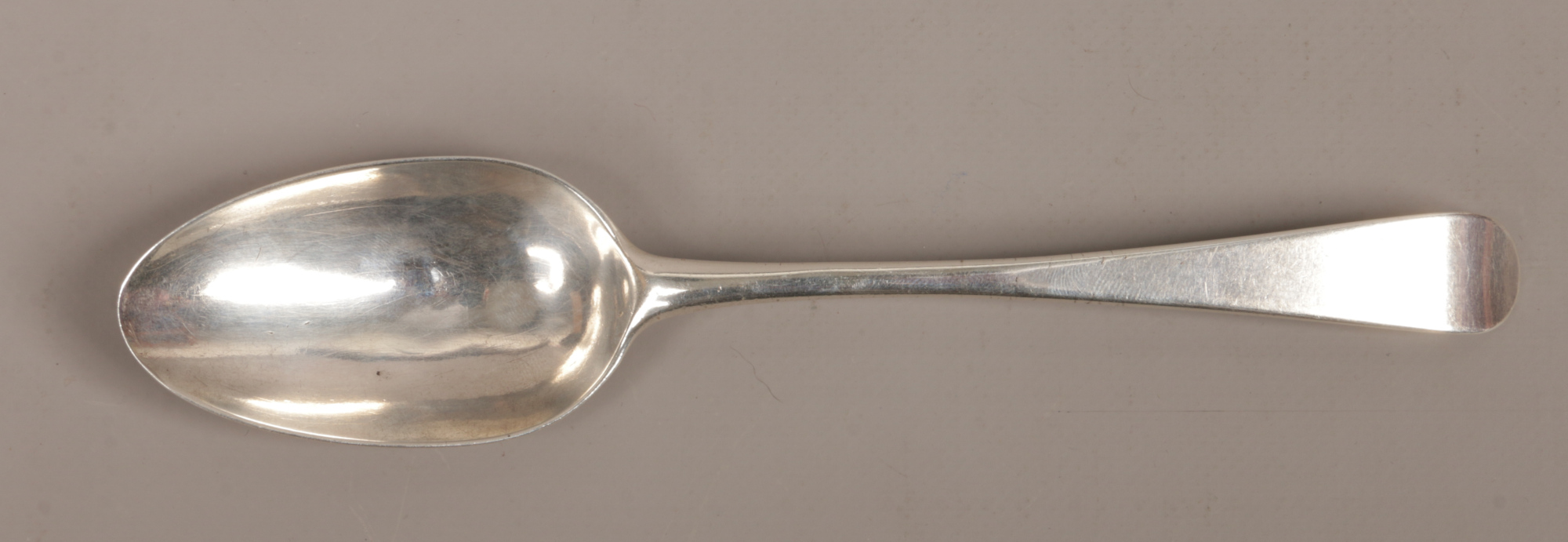 A Georgian silver dessert spoon, partial hallmarks, 58 grams.