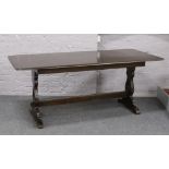 A carved oak refectory table L 182xm x W 82cm x H 76cm.