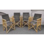 A set of four directors garden chairs.