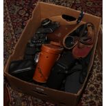 A box of cameras and binoculars to include Olympus camera, Rival camera, Pair of Regent binocualrs