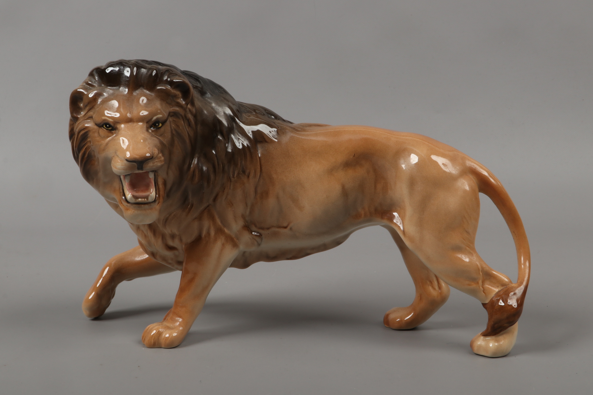 A Beswick model of a lion.