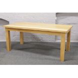 A large oak dining table raised on square legs, L 182cm x W 92cm x H 80cm.