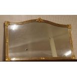 A very large ornate gilt framed arch top mirror, 112cm x 183cm.