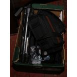 A box of photographic equipment including two tripods, Tele converter, extension tub, filter