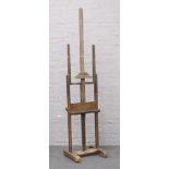 A Victorian Lechertier Barbe & Co beech and pine adjustable artists easel. Brass makers plaque