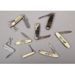 A collection of eight pen knives / multi tools to include antler and bone examples.