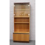 A G plan teak display unit with glazed top and cupboard base.