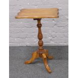 A satinwood centre pedestal occasional table.