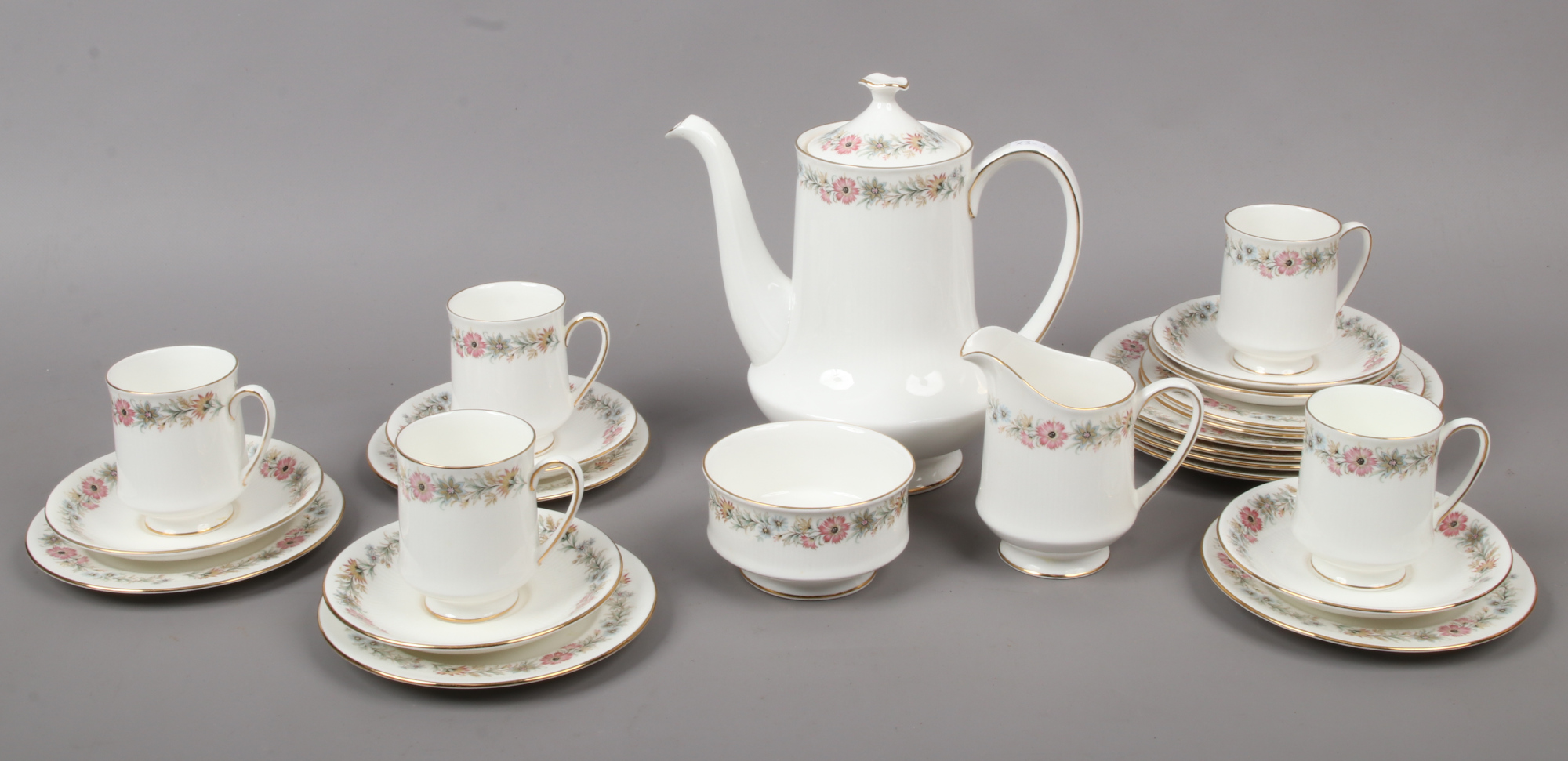 A Paragon bone china part tea set in the Belinda design including tea pot, milk jug, sugar bowl,