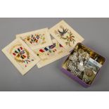 A small quantity of costume jewellery along with four World War One embroidered postcards.