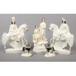 A pair of Victorian Staffordshire equestrian figures, a figure group formed as two maidens fishing