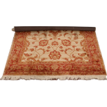 A beige ground Ziegler rug with floral design 230cm x 160cm.