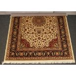 A beige ground Keshan rug with medallion design, 282cm x 201cm.