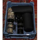 Four camera lenses including Soligor 1 : 6.3 f = 400mm and 1: 5.5 f = 300mm Tele- Auto examples,