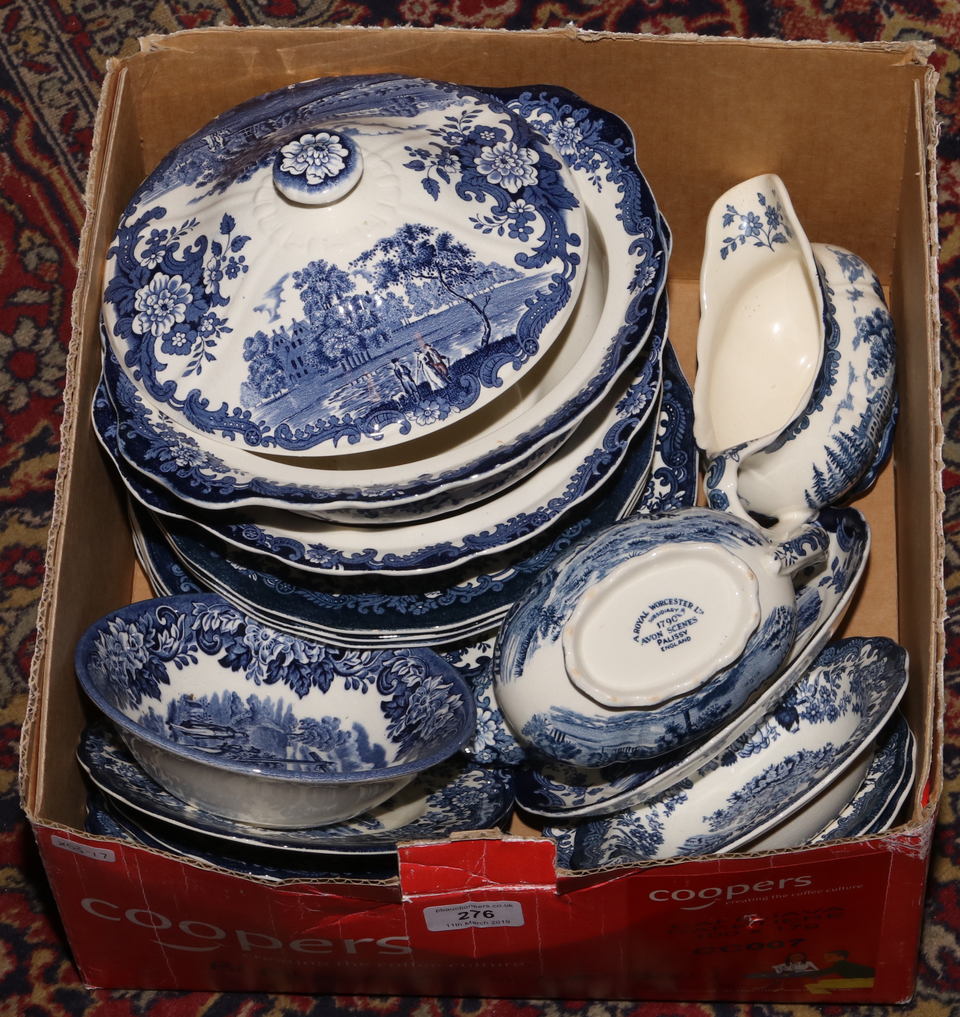 A box of Royal Worcester blue and white ceramics in the palissy design to include tureens, gravy