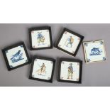A pair of blue and white Delft tiles painted with birds, along with four polychrome examples painted