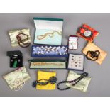 A quantity of cased costume jewellery including freshwater pearls, suite of earrings and necklace,